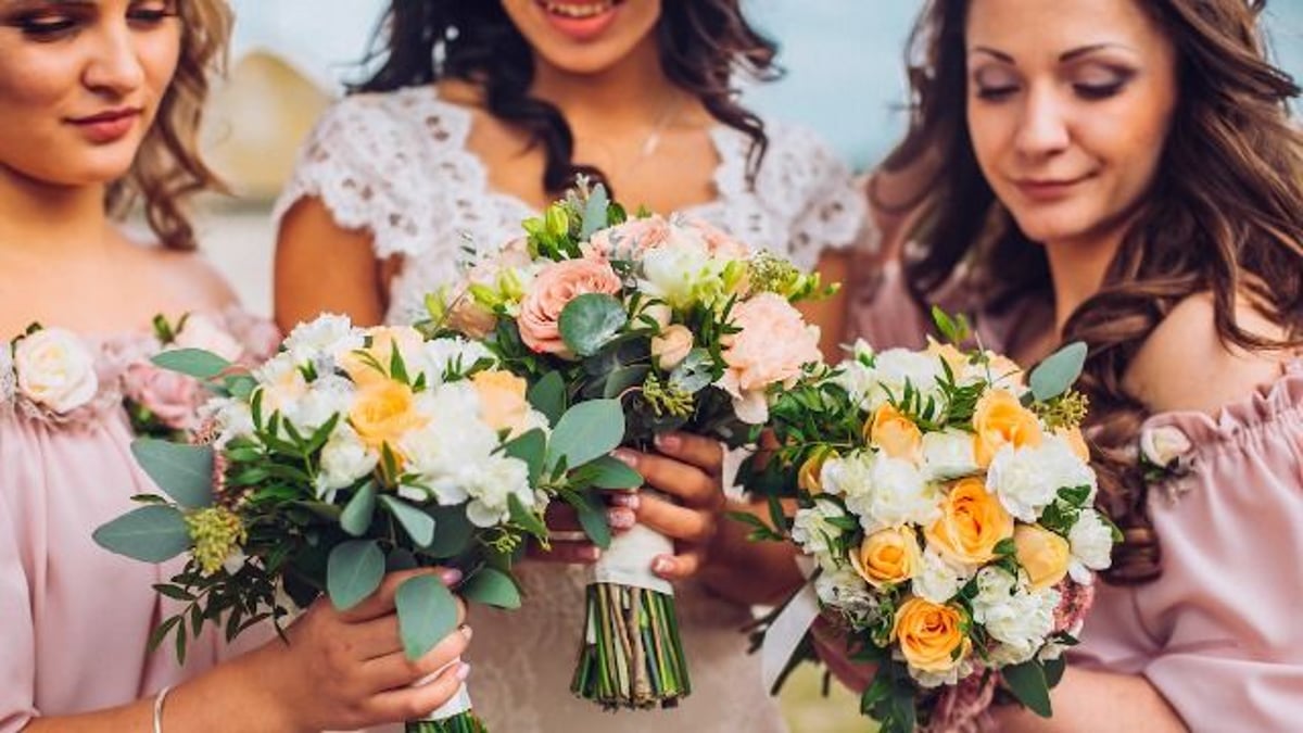 Woman catches bouquet at wedding, BF says, 'you're rude, pressuring me.' AITA?