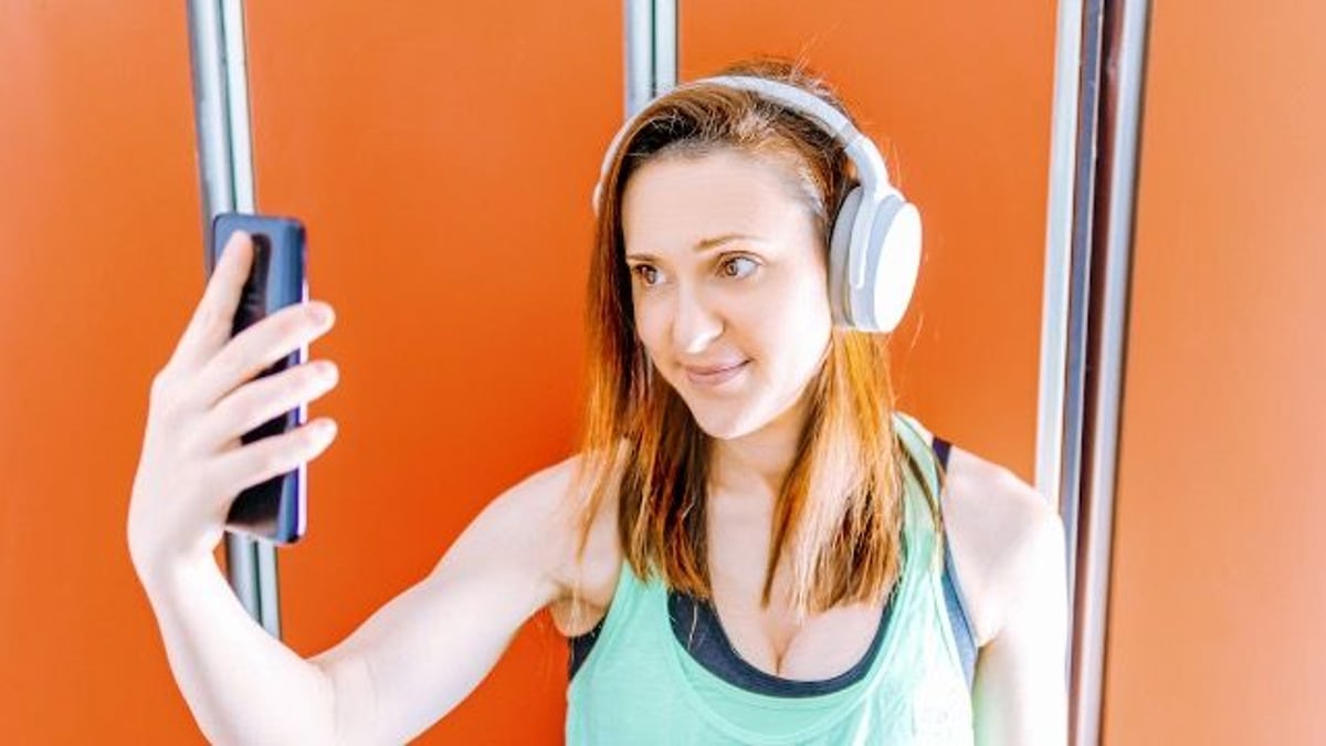 Woman refuses to stop taking pics in locker room; calls offended party 'Karen.'