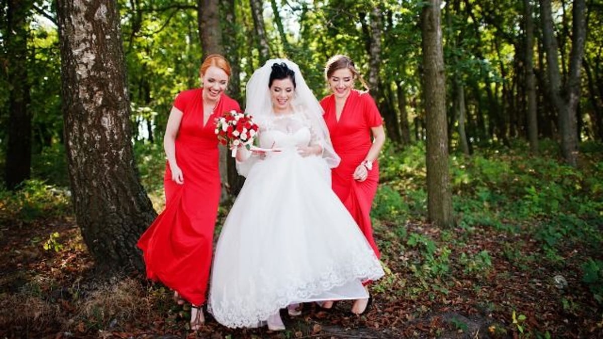 Bride kicks bridesmaid out of wedding for wearing dress that's 'too tight and revealing.'