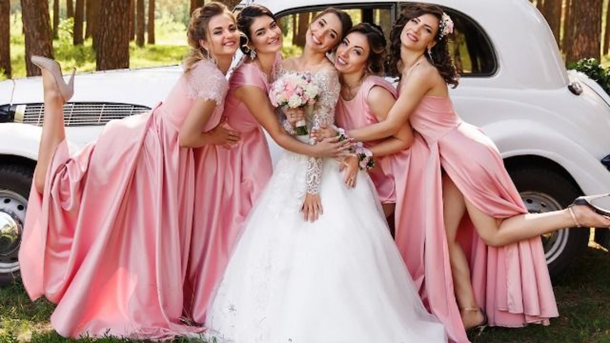 Bride refuses to change bridesmaid dress for sister who thinks pink is 'too girly.' AITA?