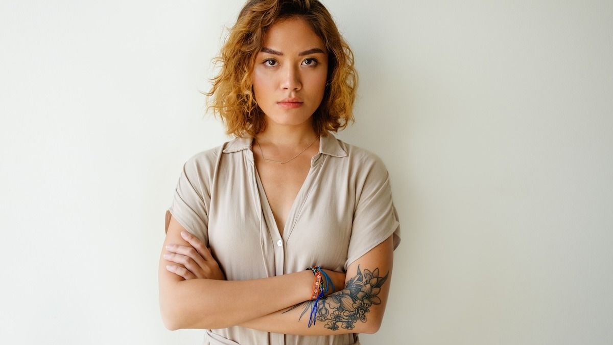 'Broke up with my girlfriend over tattoos. She no longer 'agrees' with our breakup.' AITA? + UPDATE