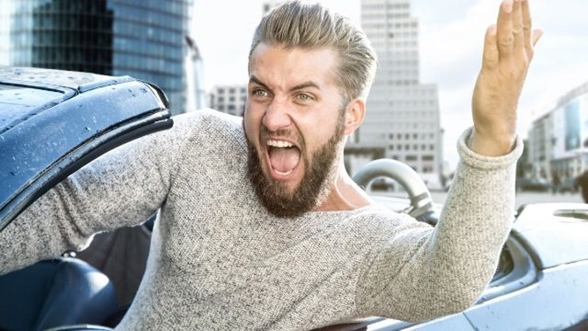 Man makes humiliating scene at car dealership when he's convinced he's being scammed.