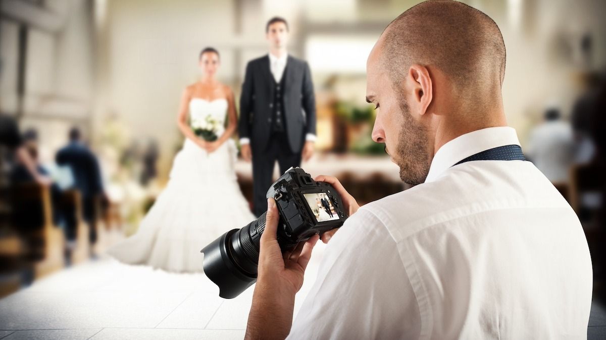 Cheap groom pushes photographer too far and he threatens to delete his wedding photos. UPDATED