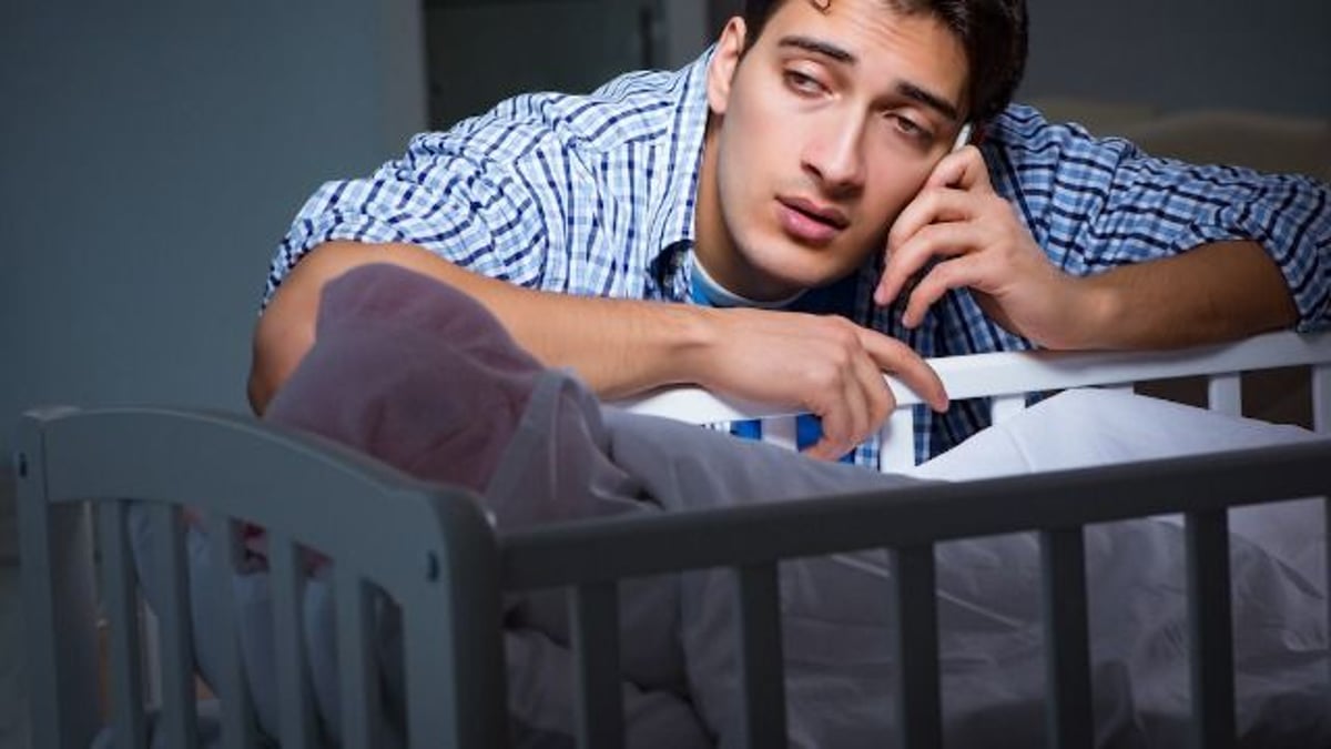 Dad won't help with newborn's night feedings because of high-stress construction job.