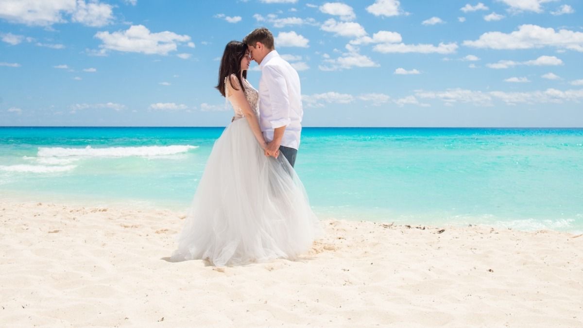 Destination bride bans guests from staying at their timeshare, 'they MUST book our block.'  AITA? UPDATED 3 YEARS LATER