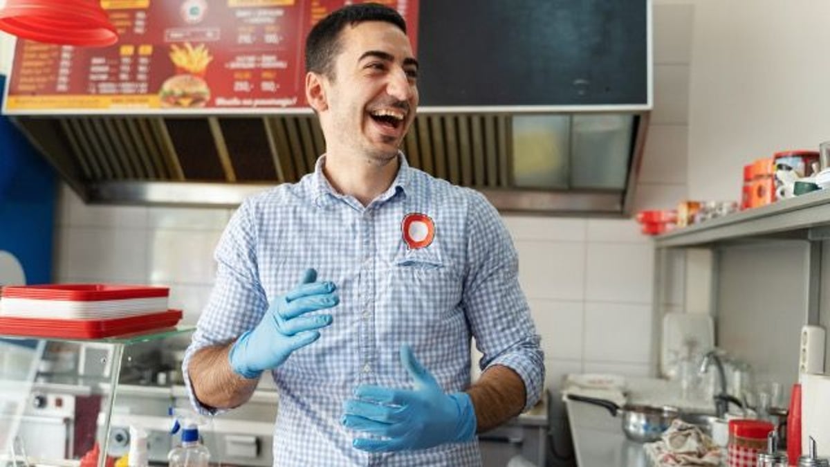 Fast food worker gets yelled at by customers for suggesting they want a hamburger.