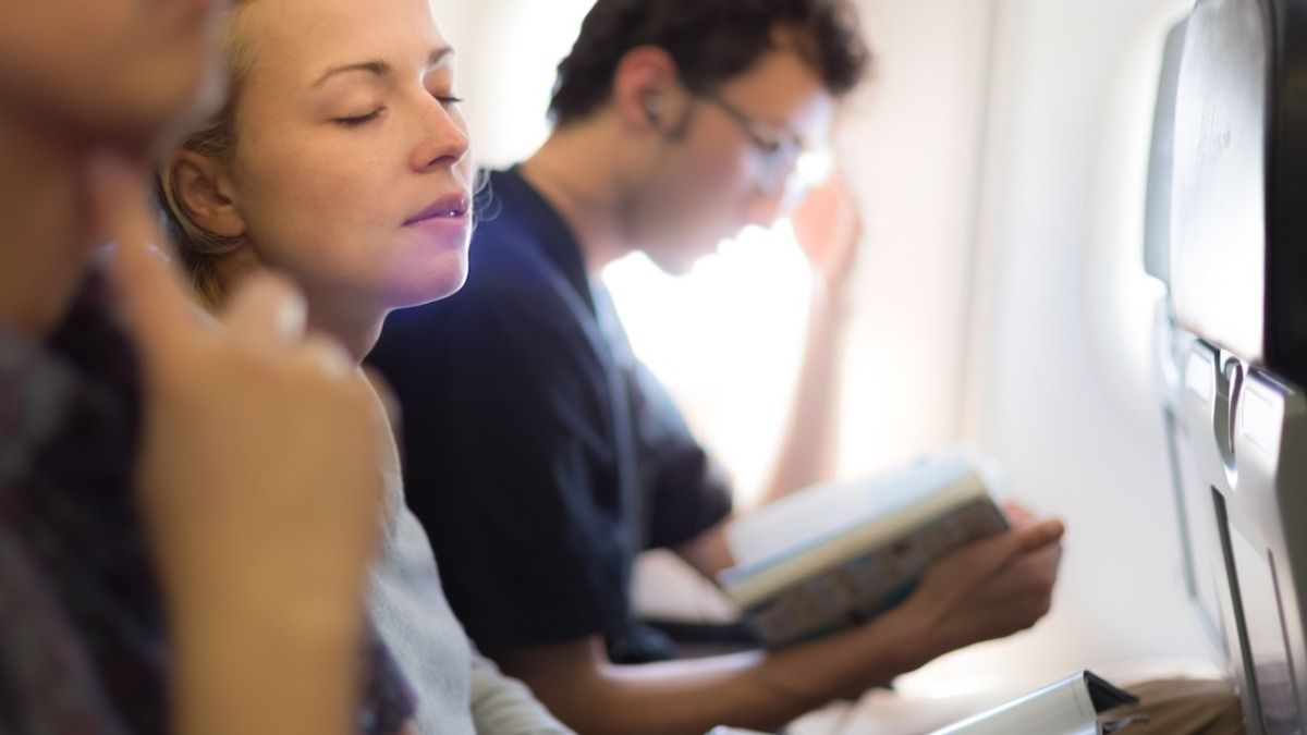 'AITA for crossing my legs on an 8-hour flight?' 'I kept the man in front of me from reclining.'