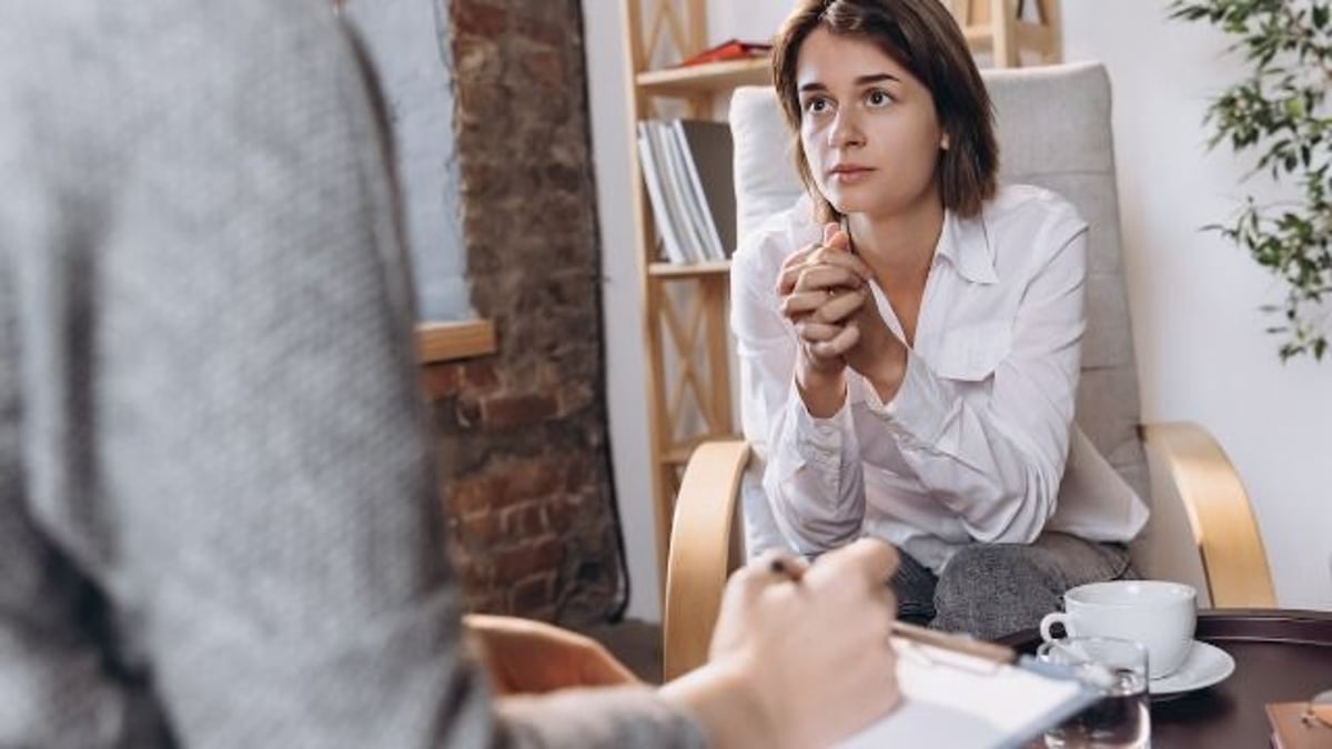 Friend promises bride a custom wedding gift, takes it back when he's uninvited; AITA?