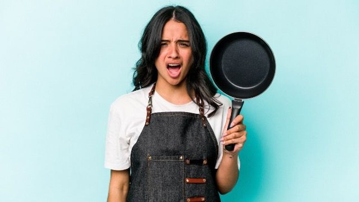 'AITA for telling my wife to wear a hairnet when she cooks?' She refuses.