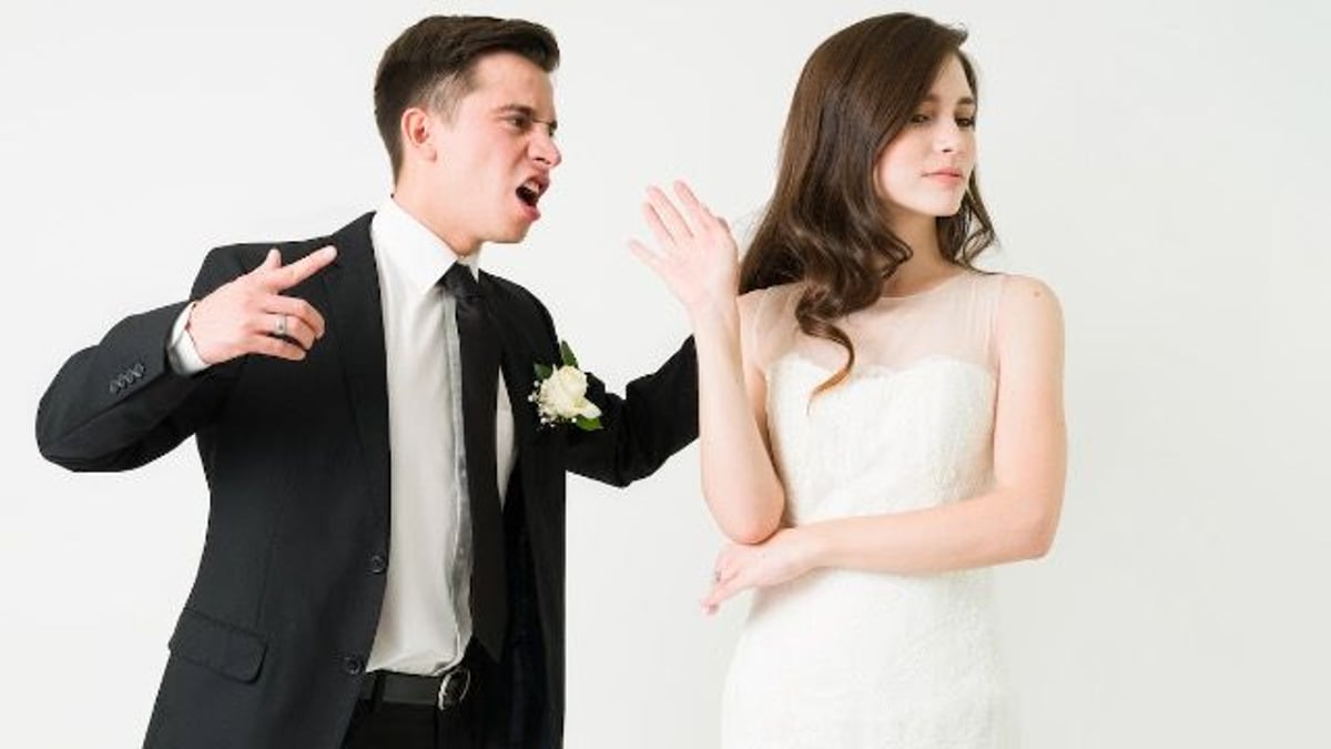 Man 'puts his foot down' and says no to his fiancés dream wedding idea. AITA?