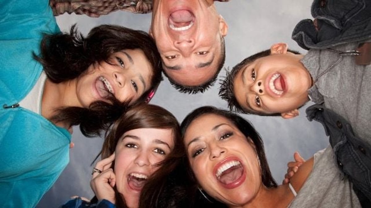 'AITA for refusing to lower the volume of my voice when I'm happy?'