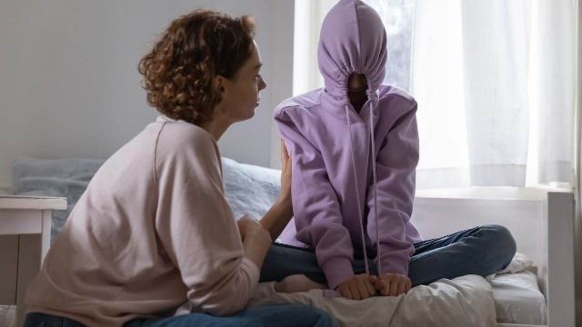 Mom asks if it was wrong to celebrate son's first word in front of mute stepkid.