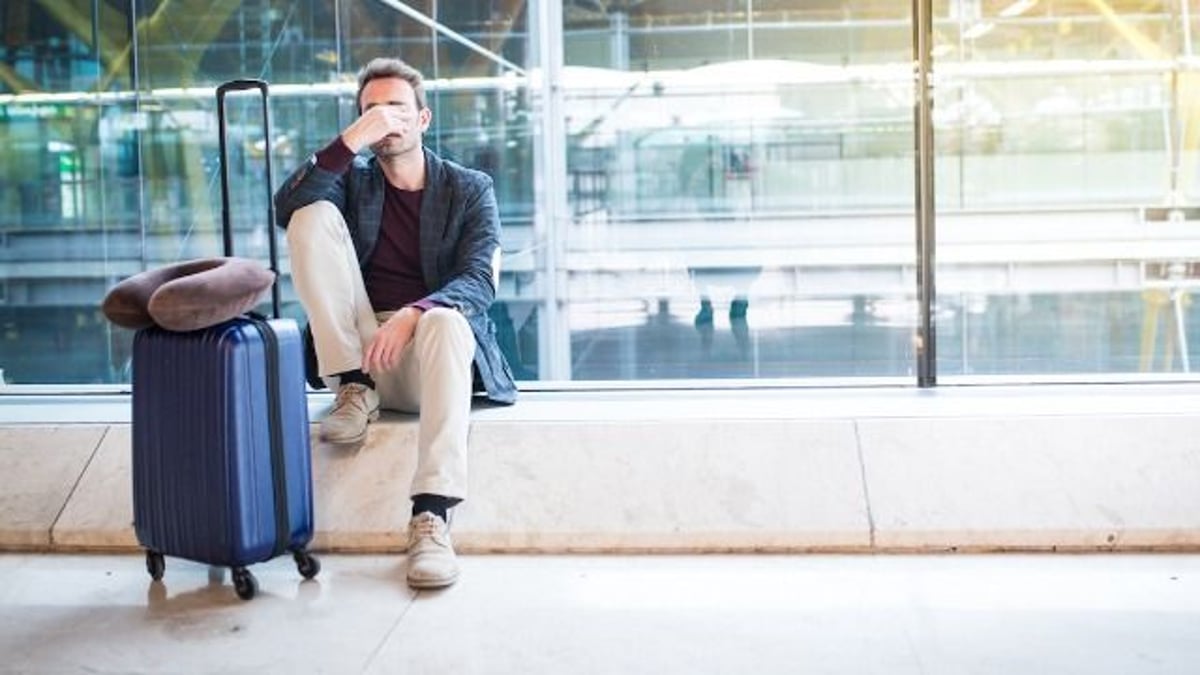 Mom brings kids to surprise husband at airport; he says 'I didn't want you to be here.'