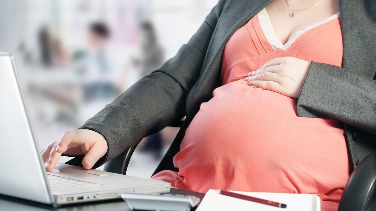 'AITA for reporting my boss after he forced me to attend a meeting while I was in labor?'