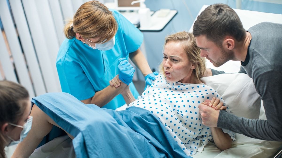 'AITA for staying in the delivery room with my stepdaughter even though she didn't want me in there?'