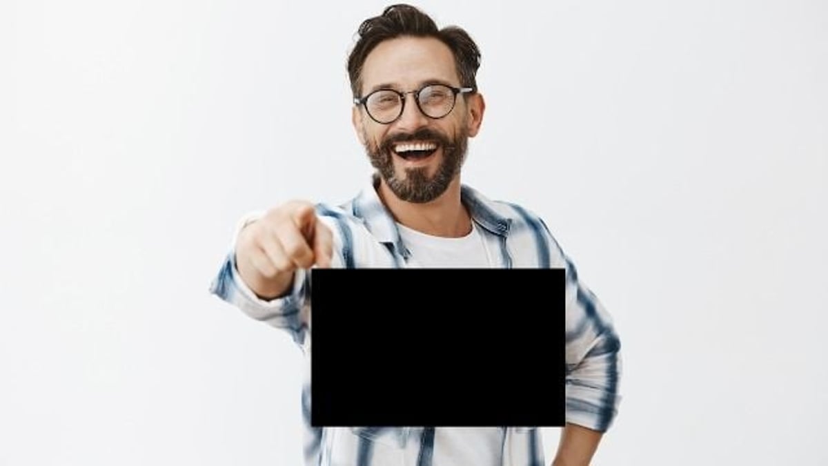 Stepdad wears shirt stepchild got in trouble for wearing to meeting with teacher.