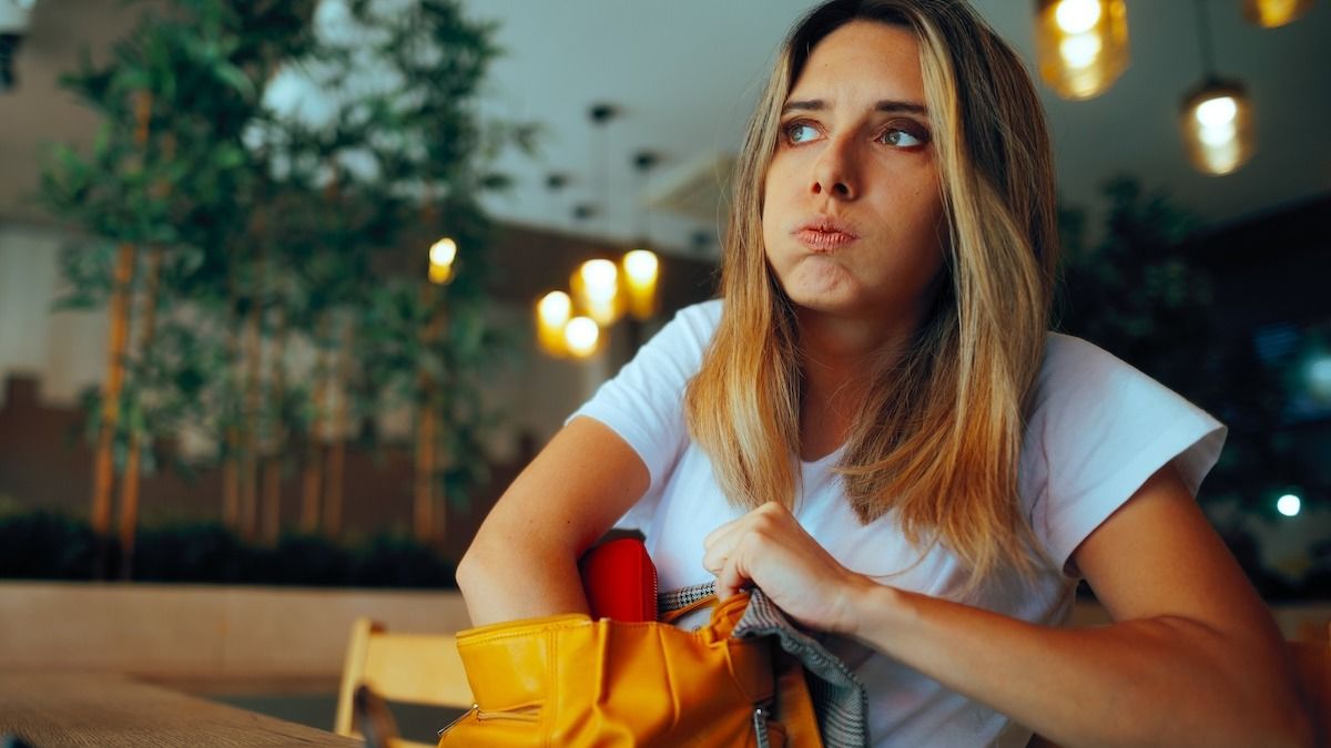 'WIBTA for suing my boyfriend's friends for destroying my designer purse?' UPDATED