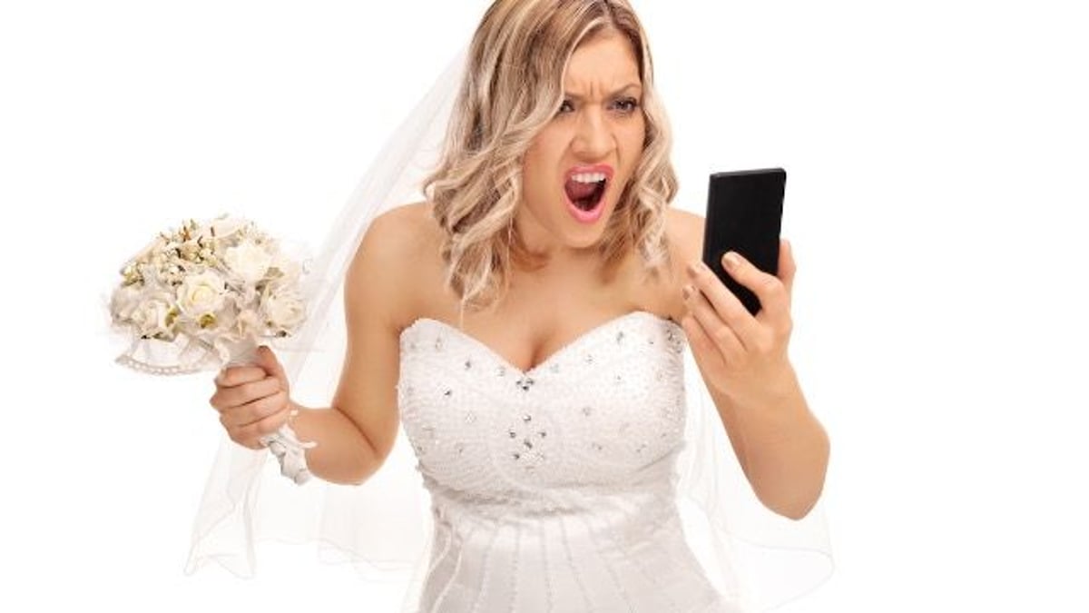 Bride kicks bridesmaid out of wedding for wearing a revealing dress. AITA?