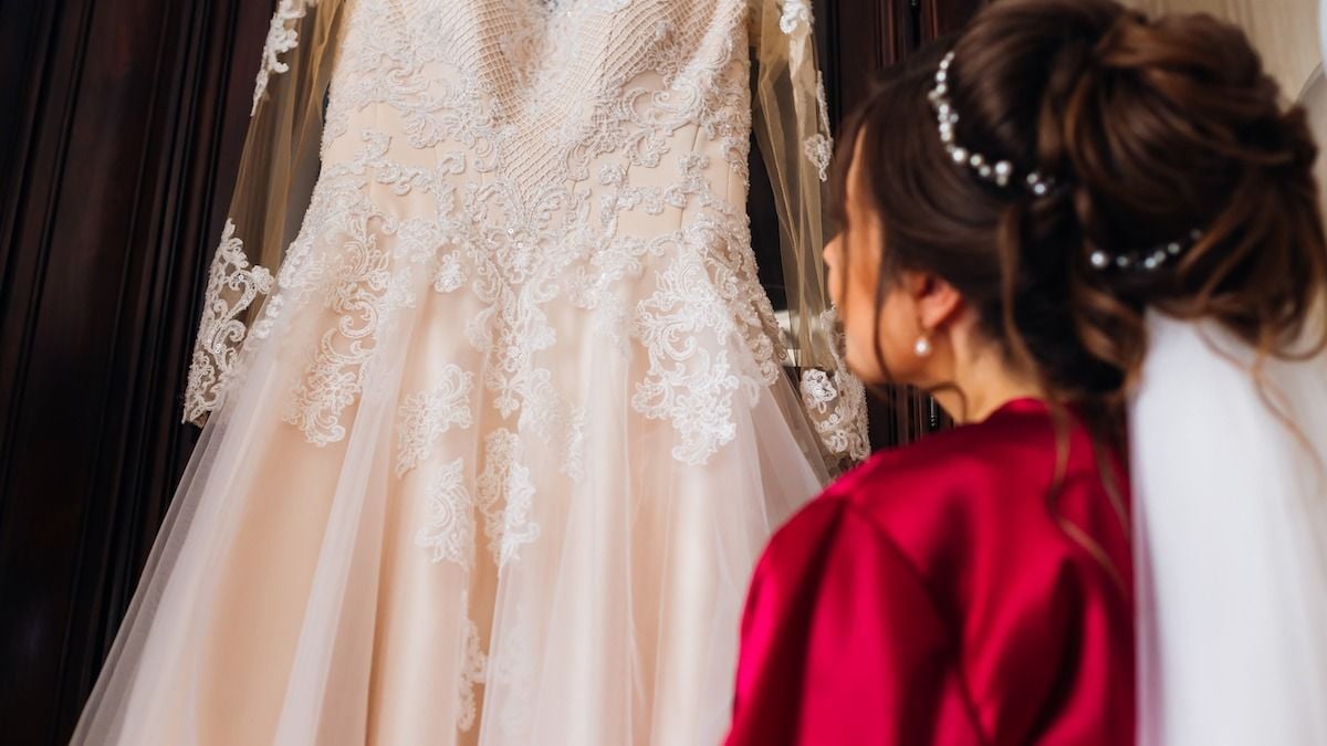 Woman looks through friend's closet to find 'lost' wedding dress; it's there. AITA?